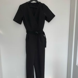 Black jumpsuit with sport belt